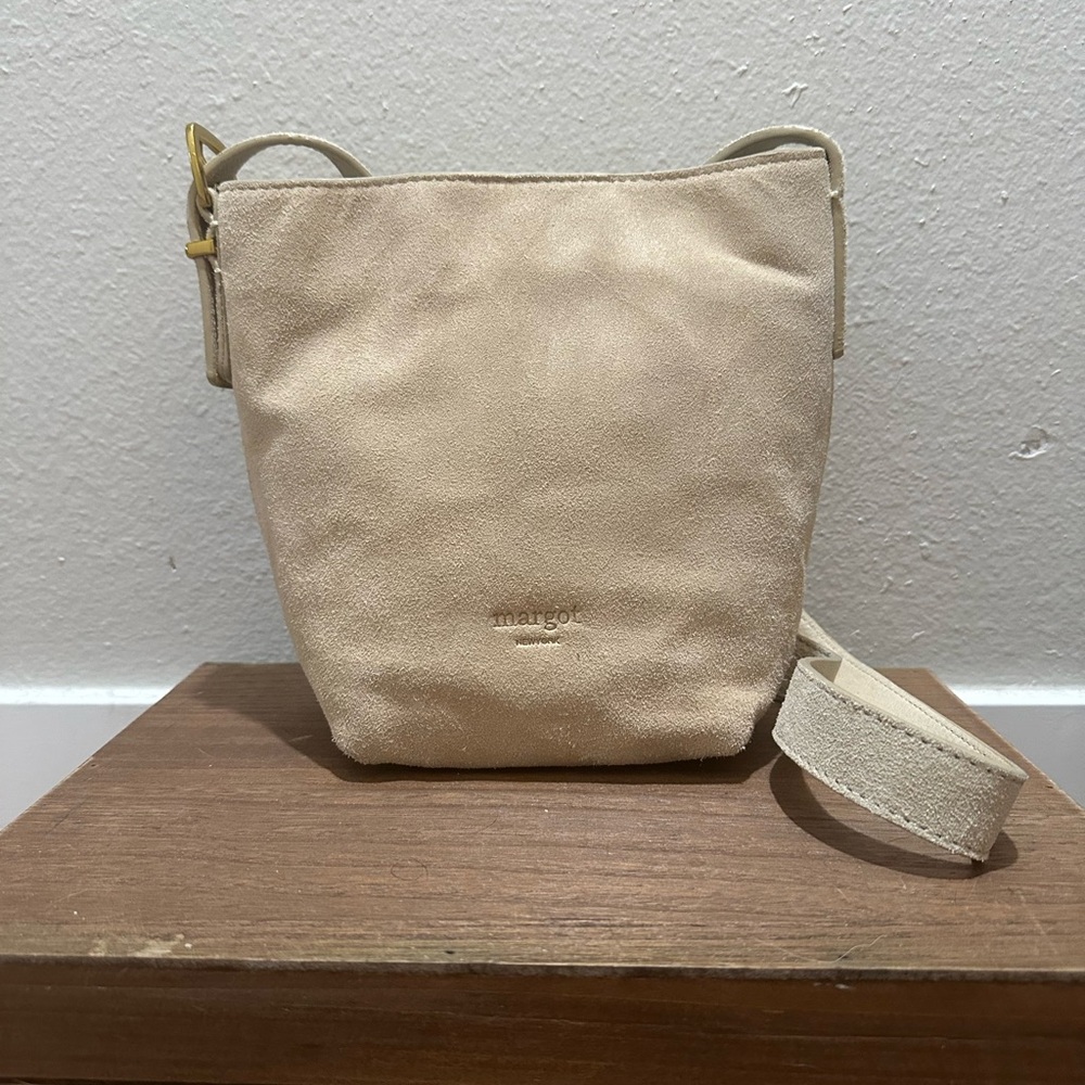 Margot New York Kaye Mini Bucket Suede Beige Leather Crossbody Adjustable Strap.